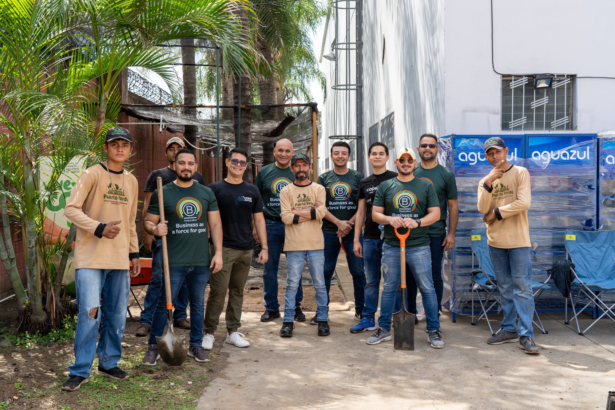 group picture of the code exitos team in seed planting activity